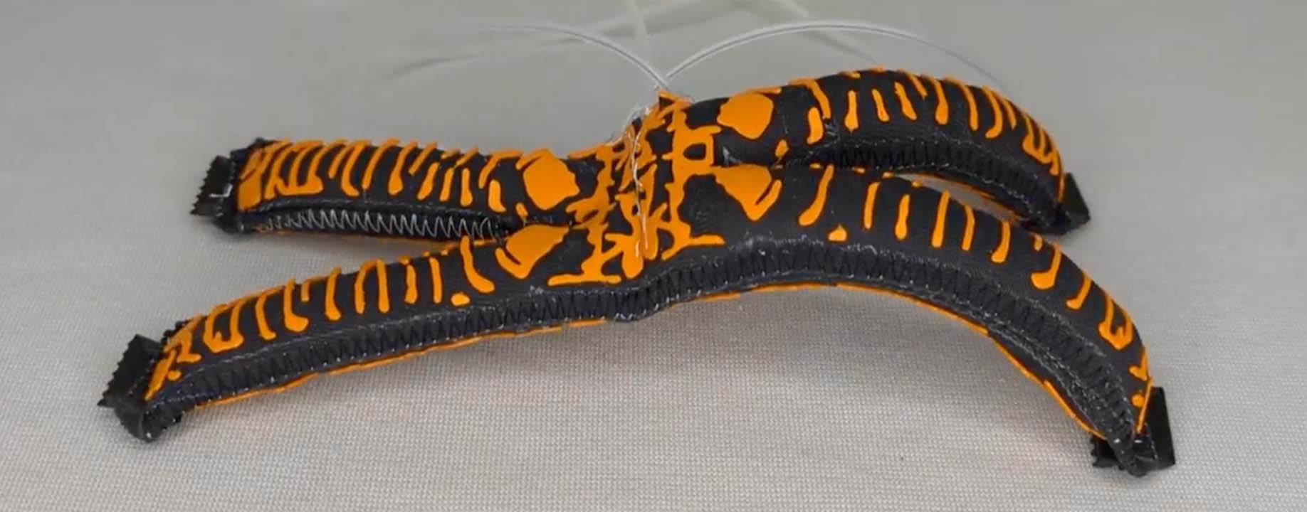 A Topology Optimization Approach for Designing Robotic Skins
